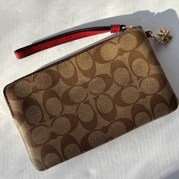 Tan Coach Signature Print Leather Wristlet Holiday Edition with Snowflake Charm - Picture 2 of 6
